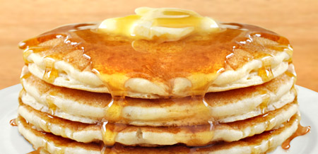 Hot pancakes with butter and syrup