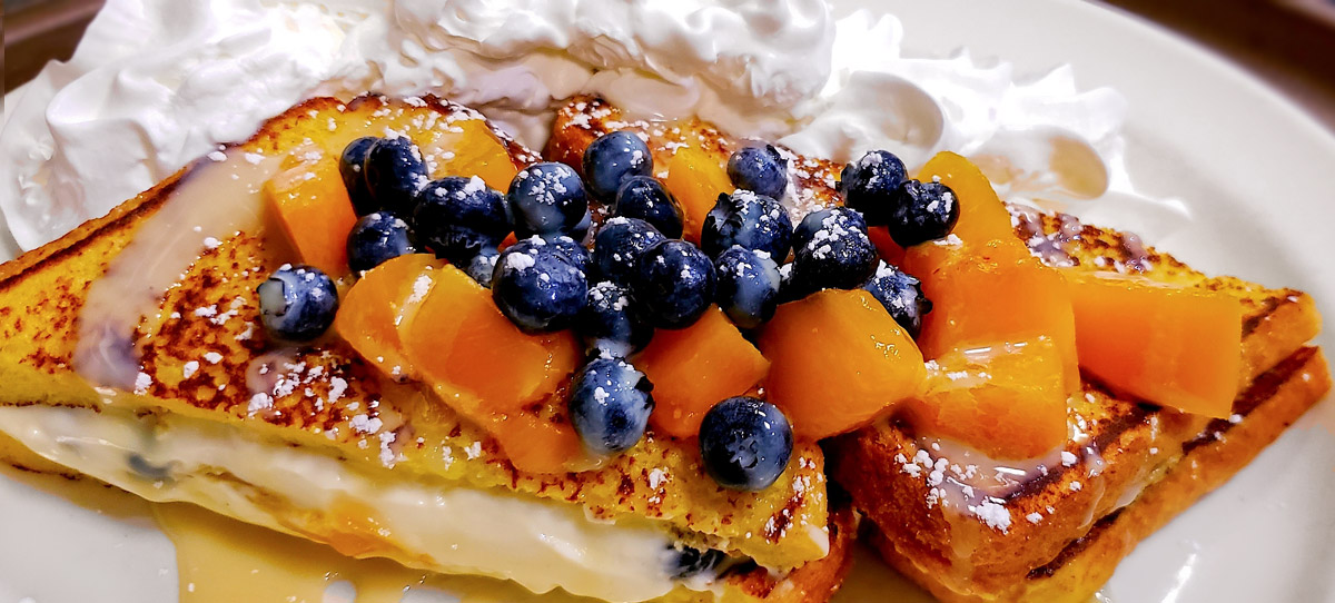 French toast with fruit and whipped cream